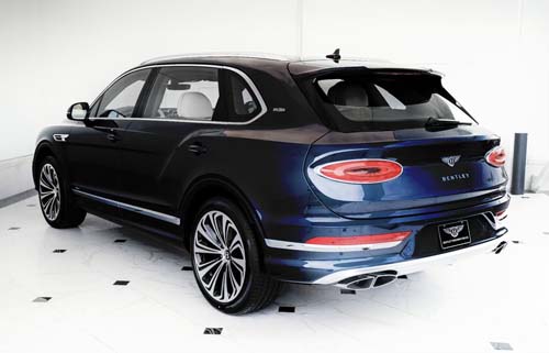 Dark blue Bentley Bentayga SUV rear view