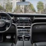 Luxury car interior with dashboard and steering wheel