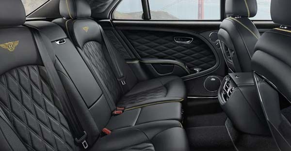 Luxury car rear seats with black leather interior