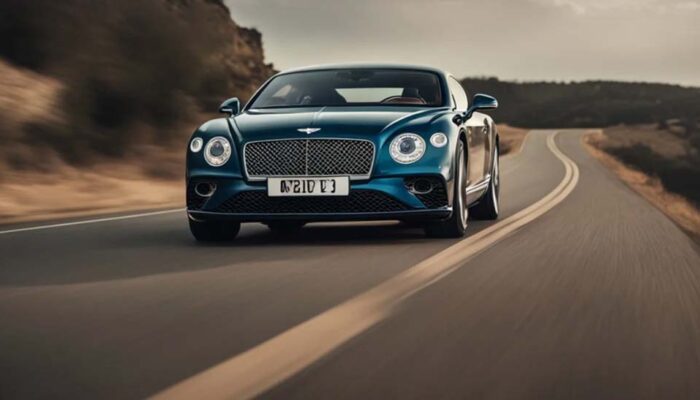Luxury Bentley driving on winding countryside road