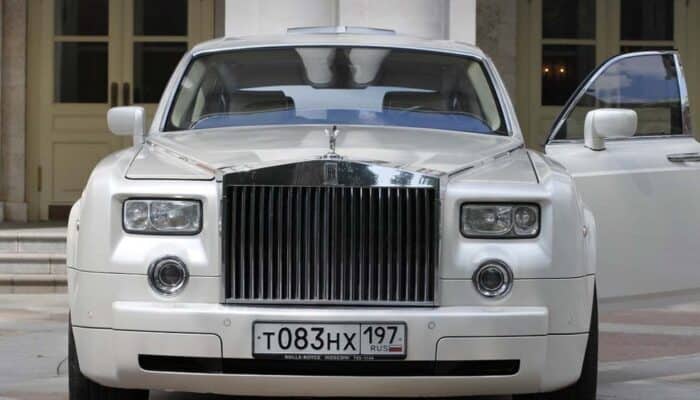 Front view of white Rolls-Royce luxury sedan