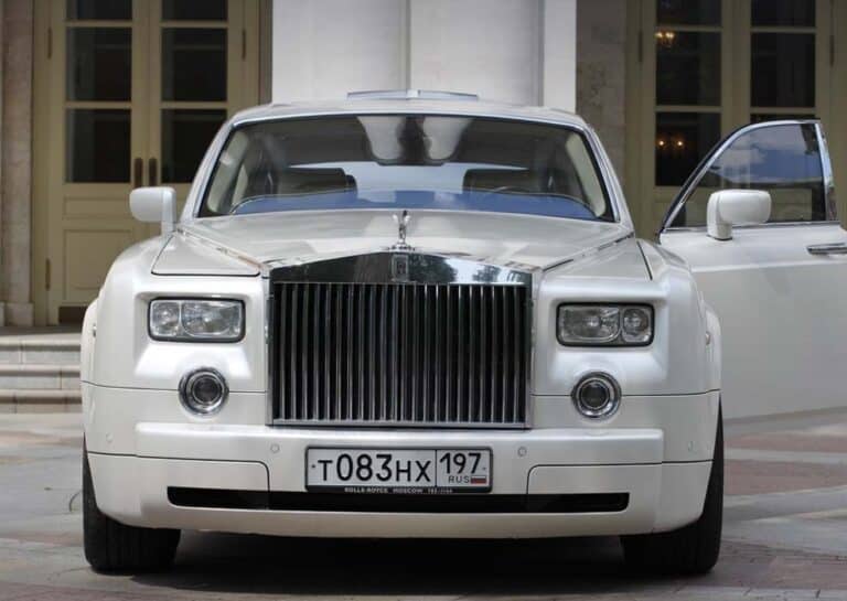 Front view of white Rolls-Royce luxury sedan