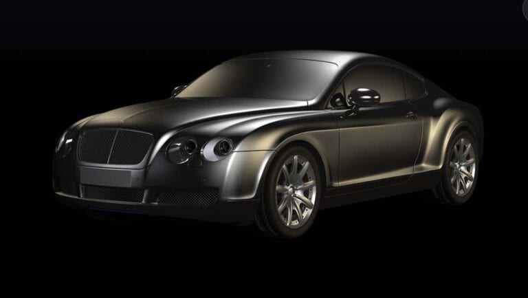 Black luxury sports coupe on dark background
