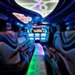 Luxury limousine interior with neon lighting and leather seats