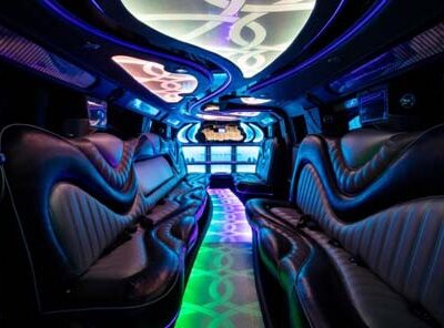 Luxury limousine interior with neon lighting and leather seats