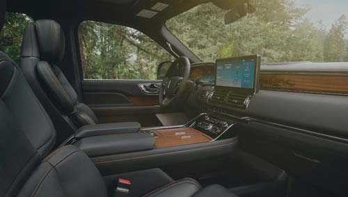 Luxury SUV interior with leather seats and touchscreen dashboard