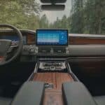 Luxury car interior with dashboard and touchscreen display