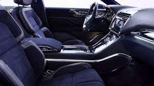 Modern car interior with front seats and dashboard