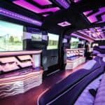 Luxury limousine interior with purple LED lighting