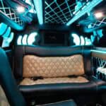 Luxury limousine interior with neon lights and leather seats