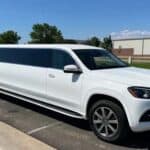 White stretch SUV limousine parked in lot