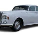 White vintage Rolls-Royce luxury sedan