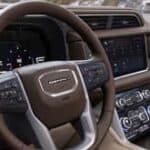Modern SUV interior with dashboard and steering wheel