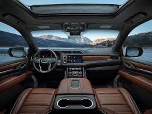 Luxury car interior with mountain lake view