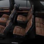 Three-row SUV interior with brown leather seats