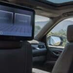 Rear-seat car entertainment screens with scenic view outside
