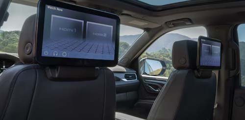 Rear-seat car entertainment screens with scenic view outside