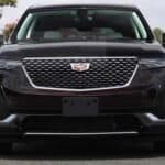 Front view of black Cadillac SUV parked outdoors