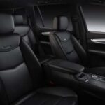 Luxury car interior with black leather seats