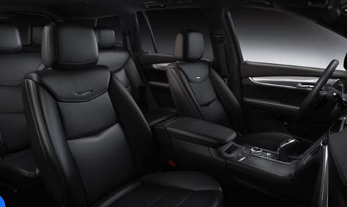 Luxury car interior with black leather seats