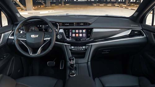 Modern Cadillac car interior with dashboard and touchscreen