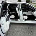 White car interior with both doors open