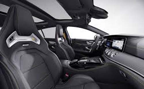 Modern car interior with leather seats and sunroof