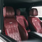 Luxurious red quilted leather car interior seats.