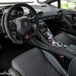 Lamborghini sports car interior with steering wheel and console