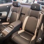 Luxury convertible rear seats with black leather interior