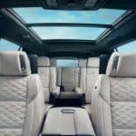 Luxury SUV interior with panoramic sunroof and leather seats