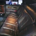 Black leather limousine rear seats interior