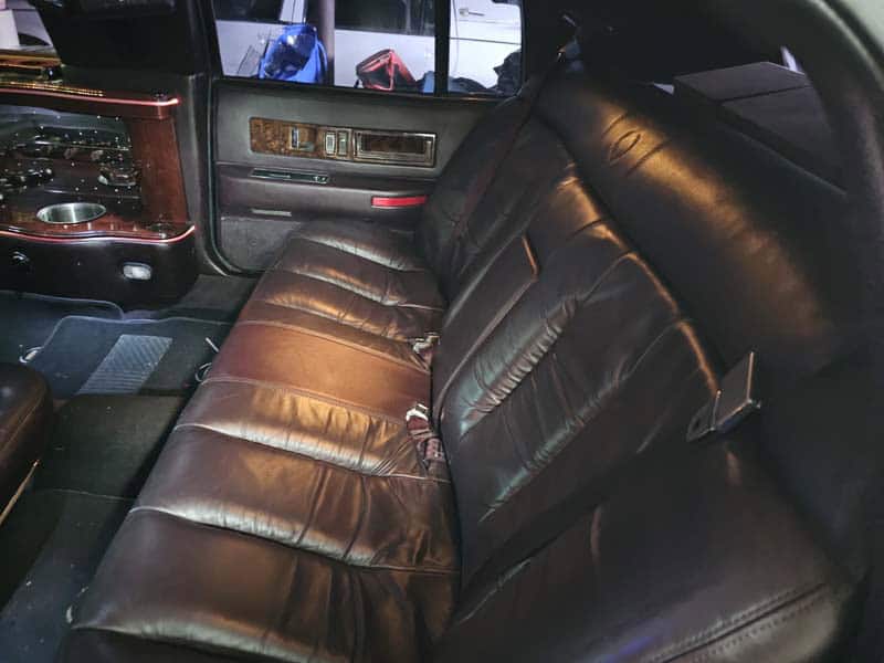 Black leather limousine rear seats interior