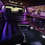 Luxury limousine interior with purple ambient lighting