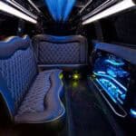 Luxury limousine interior with leather seats and neon lighting