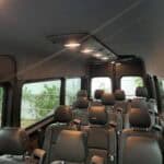 Interior of passenger van with multiple leather seats