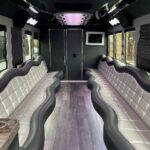 Interior of a luxury party bus with wavy leather seating