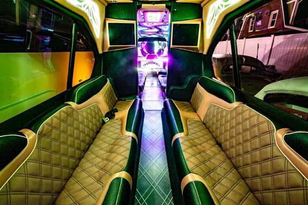 Luxury van interior with neon lighting and quilted seats