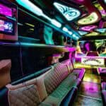 Neon-lit limousine interior with luxury seating