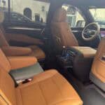 Luxury SUV interior with tan leather seats