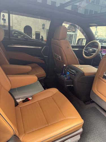 Luxury SUV interior with tan leather seats
