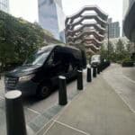 Black van parked near the Vessel, Hudson Yards.