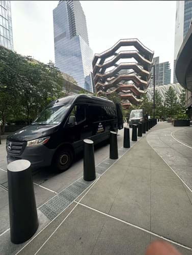 Black van parked near the Vessel, Hudson Yards.