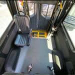 Wheelchair-accessible van interior with single seat and ramp