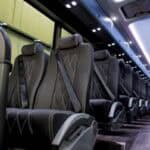 Empty modern coach bus interior with leather seats