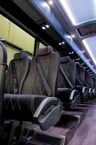 Empty modern coach bus interior with leather seats