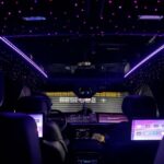 Luxury car interior with purple LED starlight ceiling
