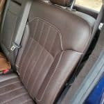 Brown leather car seat interior close-up