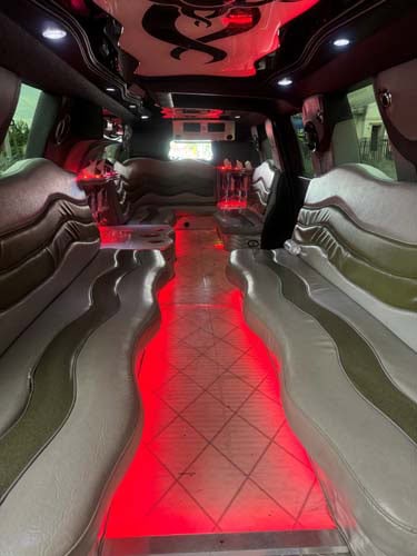 Luxury limousine interior with red LED lighting