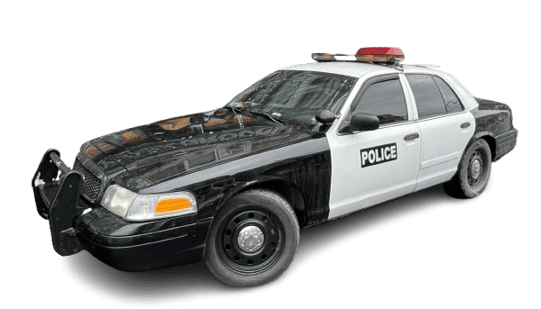 Black and white police patrol car with light bar